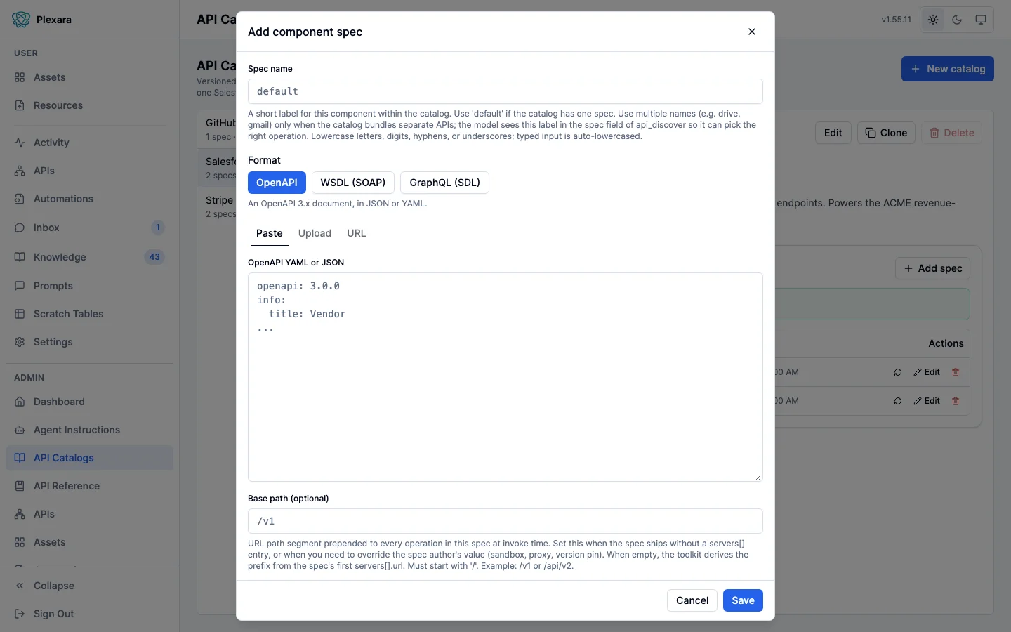 The Add component spec dialog, with a spec name field, Paste, Upload, and URL tabs for supplying the API documentation, a text area holding the start of an OpenAPI document, an optional base path, an optional title, and Cancel and Save buttons